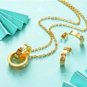 Conjunto mujer acero inoxidable moda media arracada