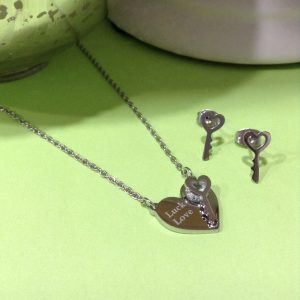Conjunto mujer acero inoxidable corazón llave