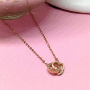 Collar mujer dije corazón y rueda acero inoxidable