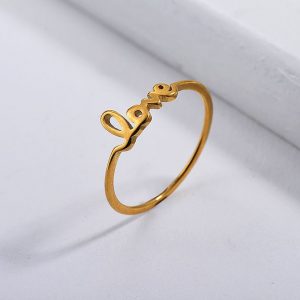 Anillo dorado love T6