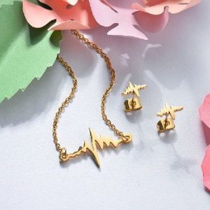 Conjunto cadena, dije y aretes dorado mod electro