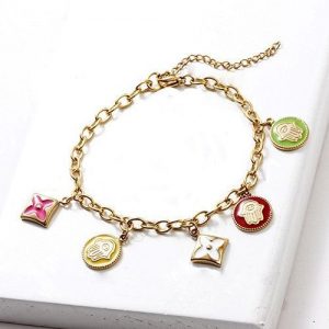 Pulsera dorada cadena con dijes