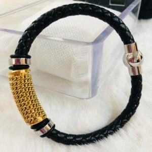 Pulsera caballero de cuero genuino negro con dorado casual