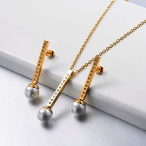 Conjunto acero inoxidable dorado con dije y aretes barra con perlas