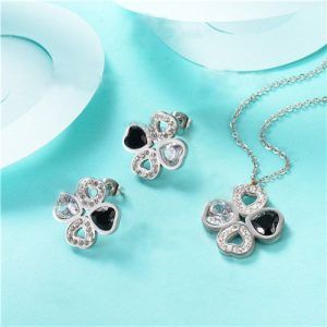 Conj cadena, dije y aretes dorado mod cuadro piedra negra