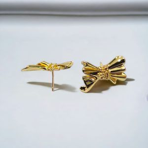 Aretes chapa oro 18k estilo moño dorado mod11803